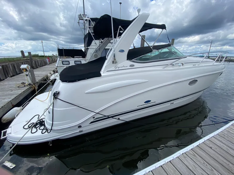 Slide: The Image of 2005 Chaparral 290 Signature boat docked at marina. - 0
