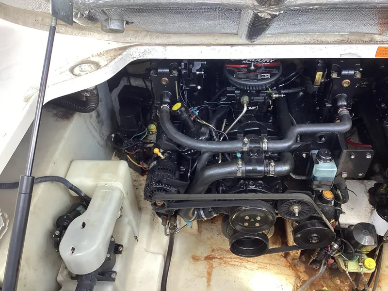 Slide: The Image of 2005 Chaparral 290 Signature engine compartment with visible components and wiring. - 39
