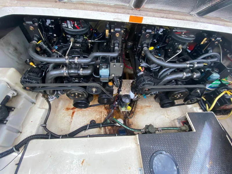 Slide: The Image of 2005 Chaparral 290 Signature engine compartment with dual engines and visible components. - 41