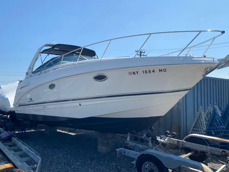 Slide: The Image of 2005 Chaparral 290 Signature boat on trailer, side view, sunny day. - 5