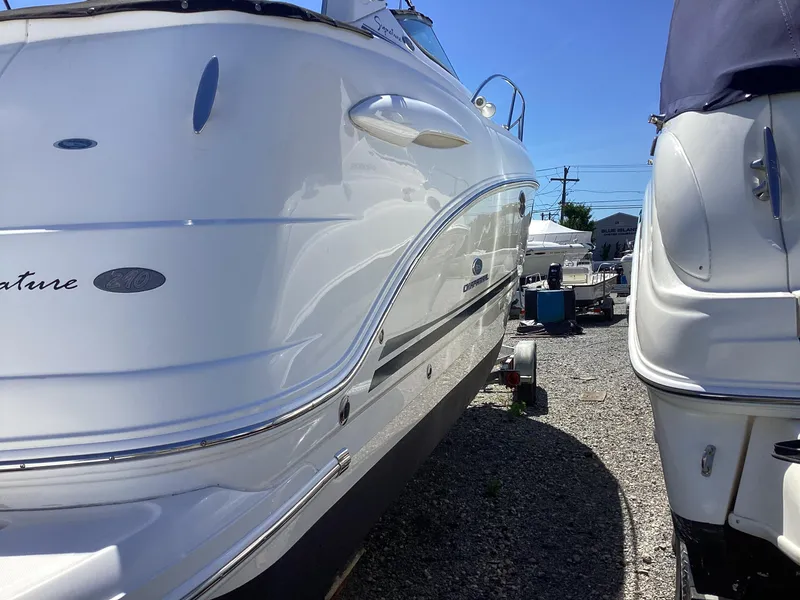 Slide: The Image of 2005 Chaparral 290 Signature boat in storage yard. - 9