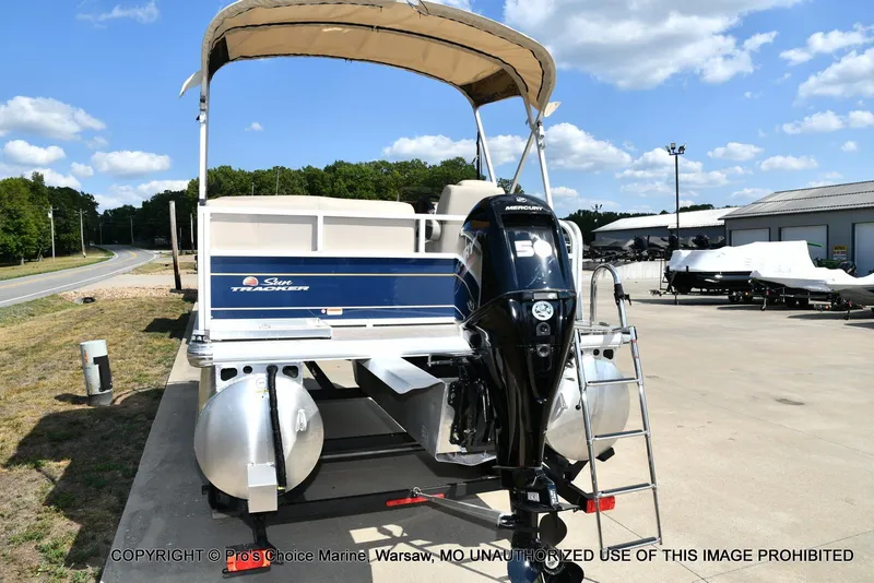 Slide: The Image of 2025 Sun Tracker Bass Buggy 16 XL Select pontoon boat with Mercury 50 engine. - 11