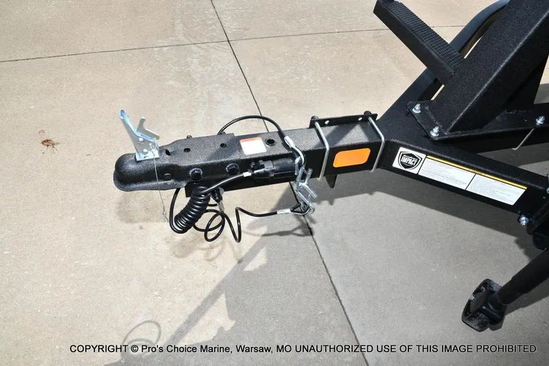 Slide: The Image of Trailer hitch of 2025 Sun Tracker Bass Buggy 16 XL Select on concrete surface. - 14