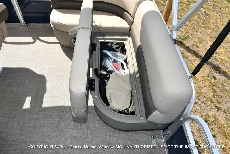 Slide: The Image of 2025 Sun Tracker Bass Buggy 16 XL Select with open storage compartment. - 38