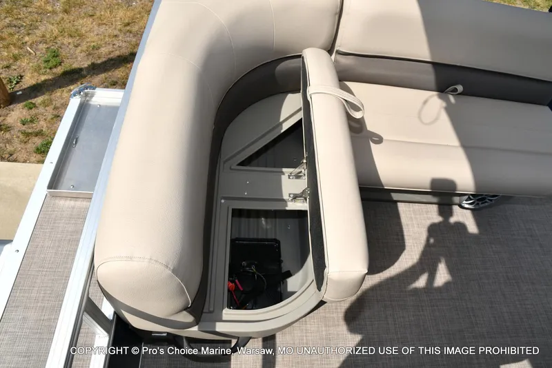 Slide: The Image of 2025 Sun Tracker Bass Buggy 16 XL Select boat seating with storage compartment. - 40