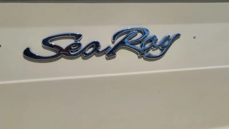 Slide: The Image of 1983 Sea Ray 360 Aft Cabin logo on boat exterior. - 27