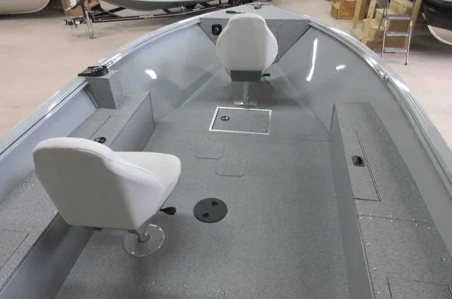 Slide: The Image of 2023 Smoker Craft Freedom 160 TL interior with two white seats and gray flooring. - 8