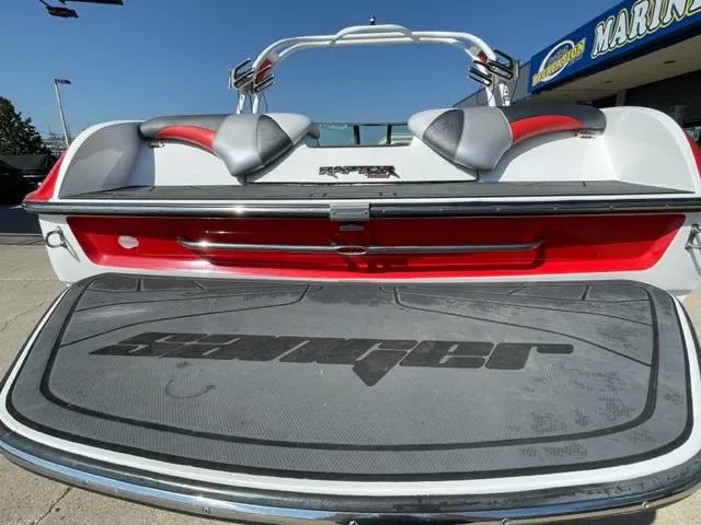 Slide: The Image of 2015 Sanger V 212 boat rear view with logo and swim platform. - 4