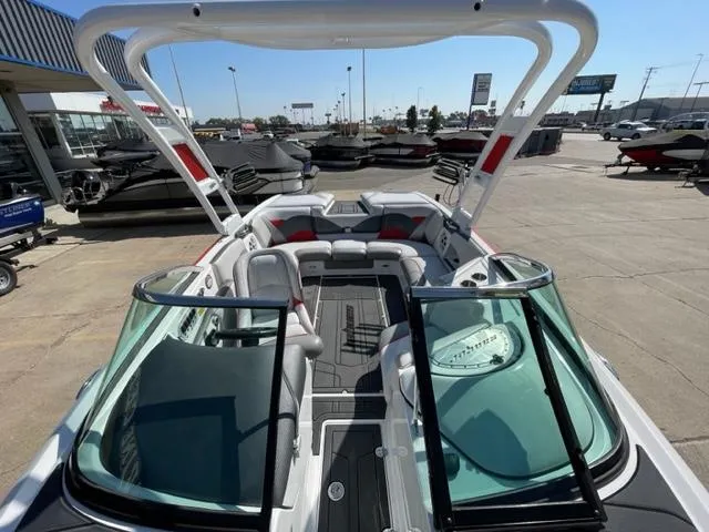 Slide: The Image of 2015 Sanger V 212 boat interior at a dealership. - 6