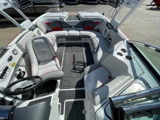Slide: The Image of 2015 Sanger V 212 boat interior with gray and red seating. - 8