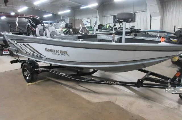 The Image of 2023 Smoker Craft Pro Angler XL 171 boat on trailer in showroom. - 0