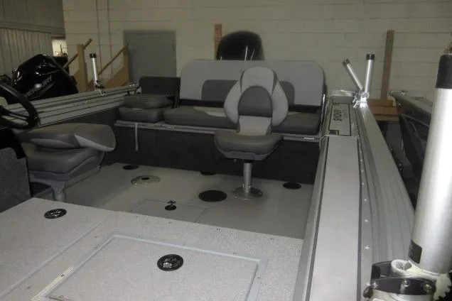 Slide: The Image of 2023 Smoker Craft Pro Angler XL 171 interior with seating and fishing rod holders. - 5