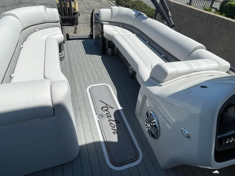 Slide: The Image of 2024 Avalon 2585 Catalina Funship interior with luxurious seating and sleek design. - 10