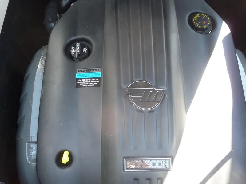 Slide: The Image of 2023 Malibu 21 LX Monsoon engine close-up. - 18