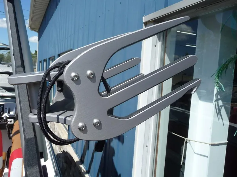 Slide: The Image of 2023 Malibu 21 LX boat wakeboard rack close-up. - 9