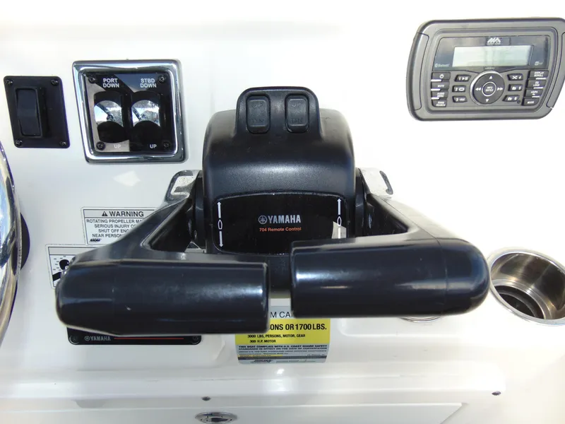 Slide: The Image of Control panel of 2016 Cobia 237 Center Console boat with Yamaha throttle. - 10