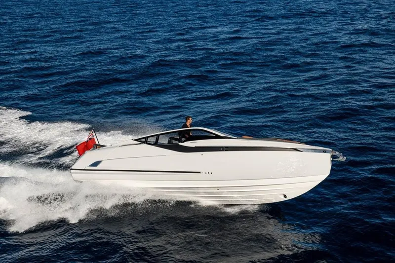 Slide: The Image of 2022 Fairline F//Line 33 luxury yacht cruising on open sea. - 28