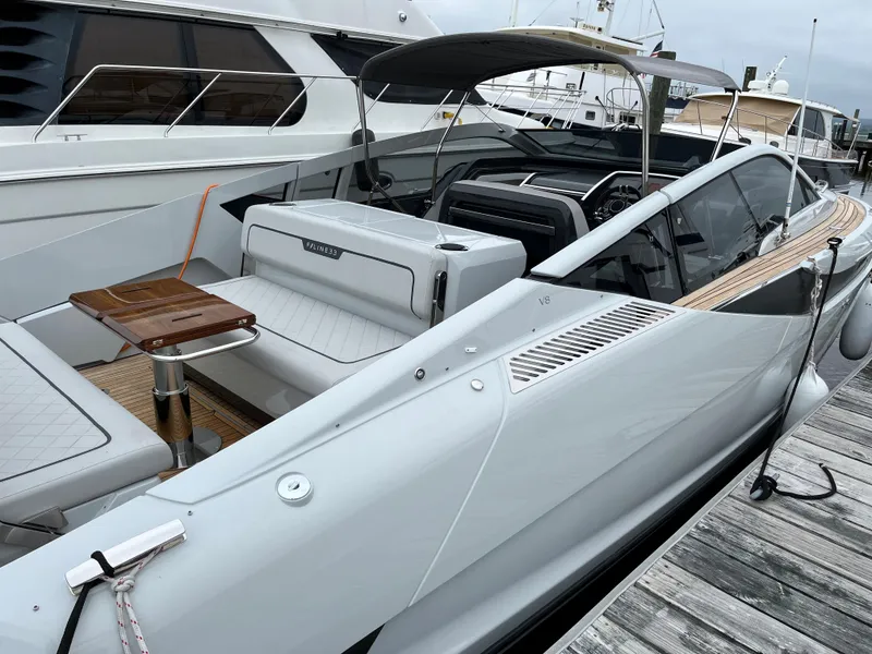 Slide: The Image of 2022 Fairline F//Line 33 luxury yacht docked at marina. - 6