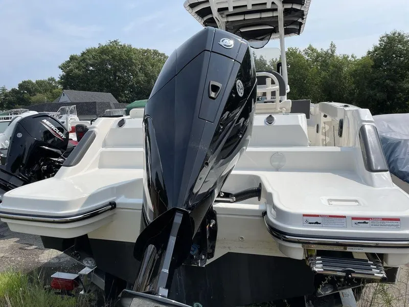 Slide: The Image of 2023 Bayliner Trophy 24 CC boat with powerful outboard motor. - 11