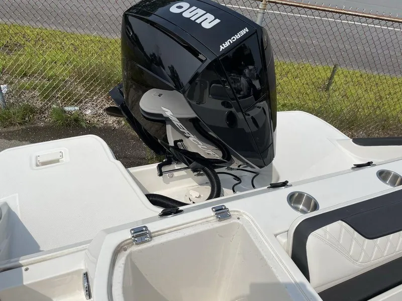 Slide: The Image of 2023 Bayliner Trophy 24 CC with Mercury outboard engine. - 2