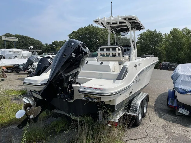 Slide: The Image of 2023 Bayliner Trophy 24 CC boat on a trailer, rear view. - 9