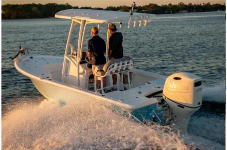 Slide: The Image of 2023 Sea Pro 208 Bay Boat with T-Top cruising on water. - 15