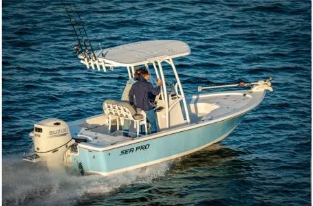 Slide: The Image of 2023 Sea Pro 208 Bay Boat with T-Top cruising on water. - 6