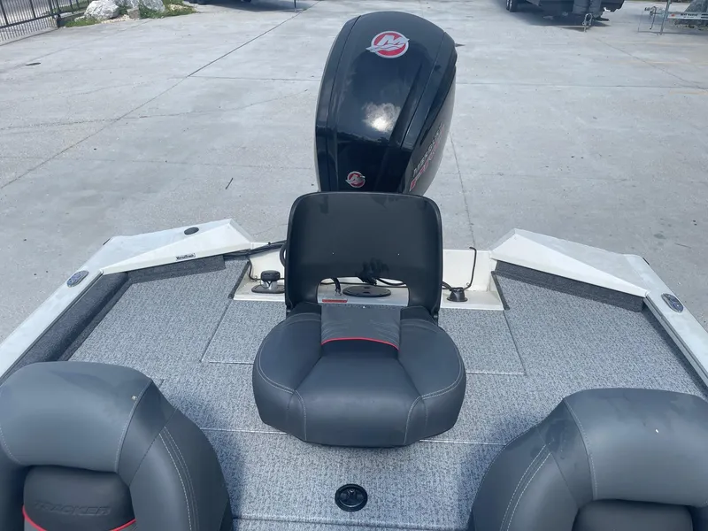 Slide: The Image of 2024 Tracker Pro Team 190 TX boat dashboard with steering wheel and gauges. - 20