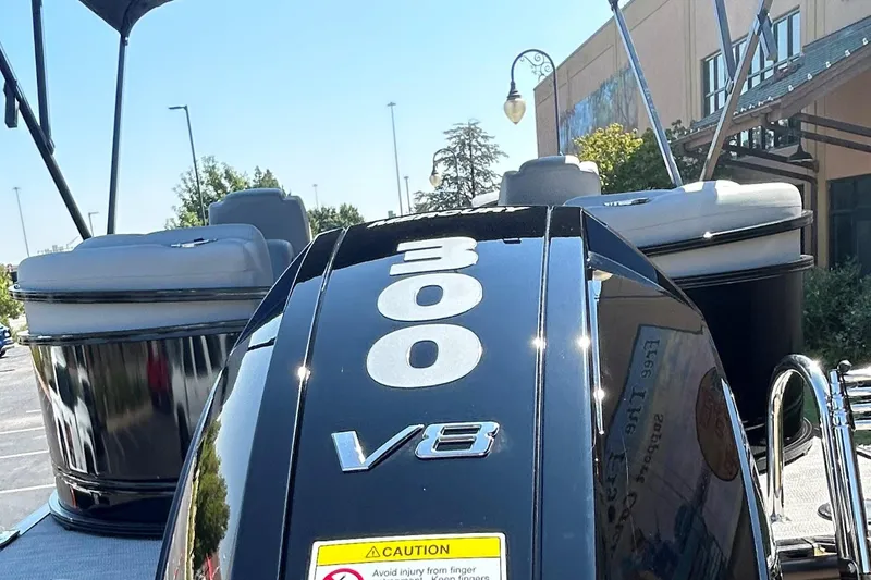 Slide: The Image of 2024 Regency 250 LE3 boat with 300 V8 engine, outdoor display. - 10