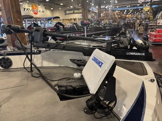 Slide: The Image of 2023 Nitro ZV20 Pro boat dashboard with Lowrance navigation system in showroom. - 6