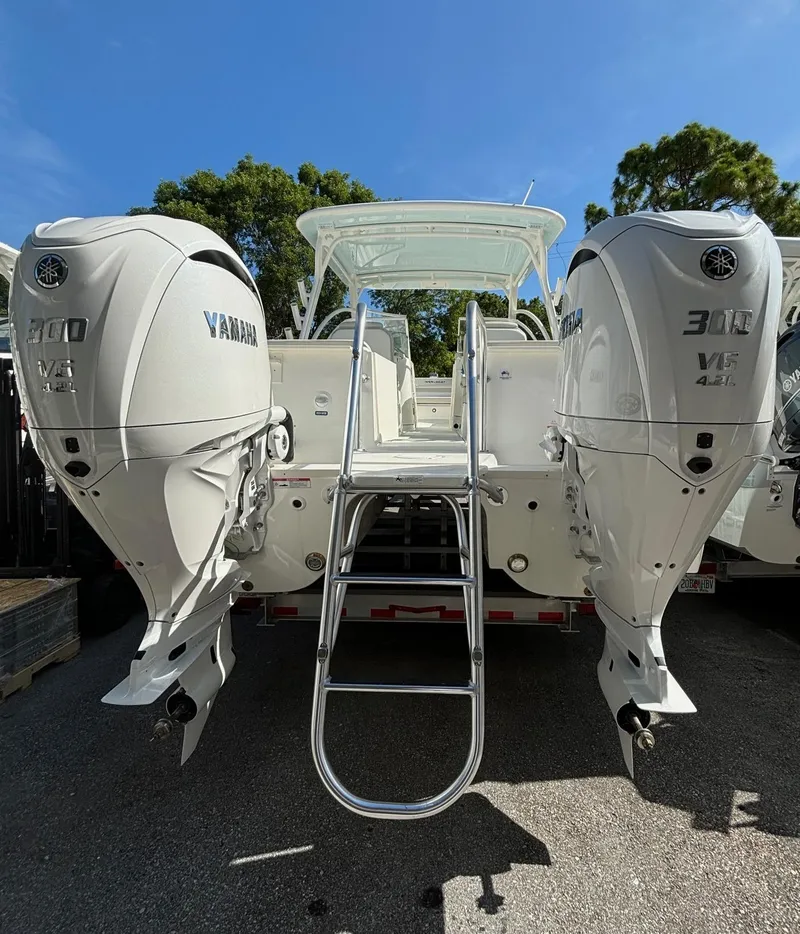 Slide: The Image of 2024 World Cat 296 DC with twin Yamaha 300 V6 outboard engines. - 4