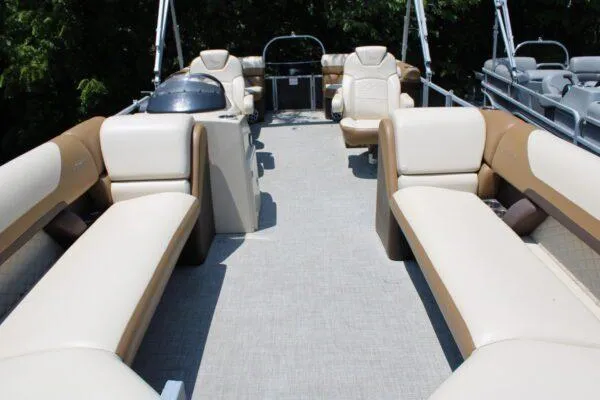 Slide: The Image of 2022 Lowe SS270 pontoon boat with spacious seating and modern design. - 7