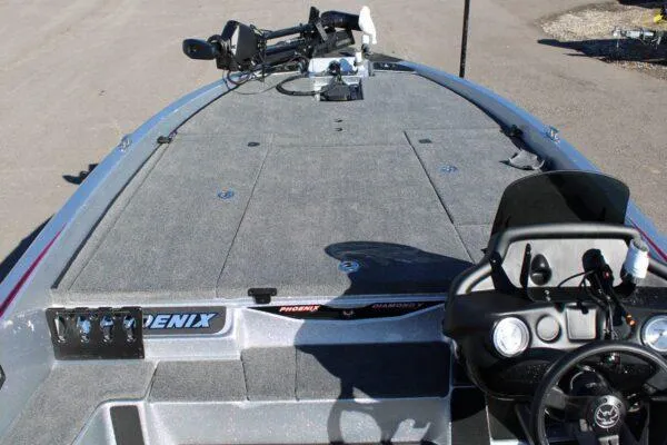 Slide: The Image of 2023 Phoenix 921 ELITE boat deck and control console. - 11