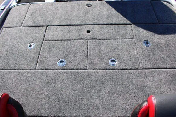 Slide: The Image of 2023 Phoenix 921 ELITE boat deck with storage compartments and seating. - 3