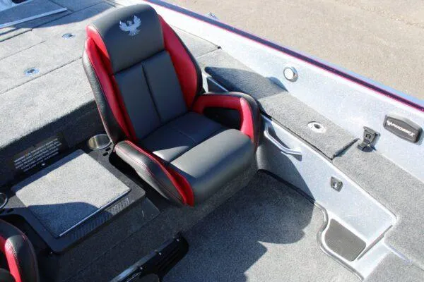 Slide: The Image of 2023 Phoenix 921 ELITE boat interior with red and black captain's chair. - 5