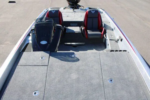 Slide: The Image of 2023 Phoenix 921 ELITE boat interior with dual seats and spacious deck. - 6
