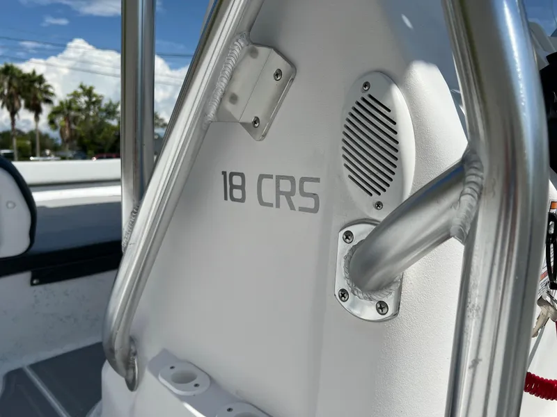 Slide: The Image of 2024 ALK2 Powerboats 18 CRS model interior detail with speaker and railing. - 13