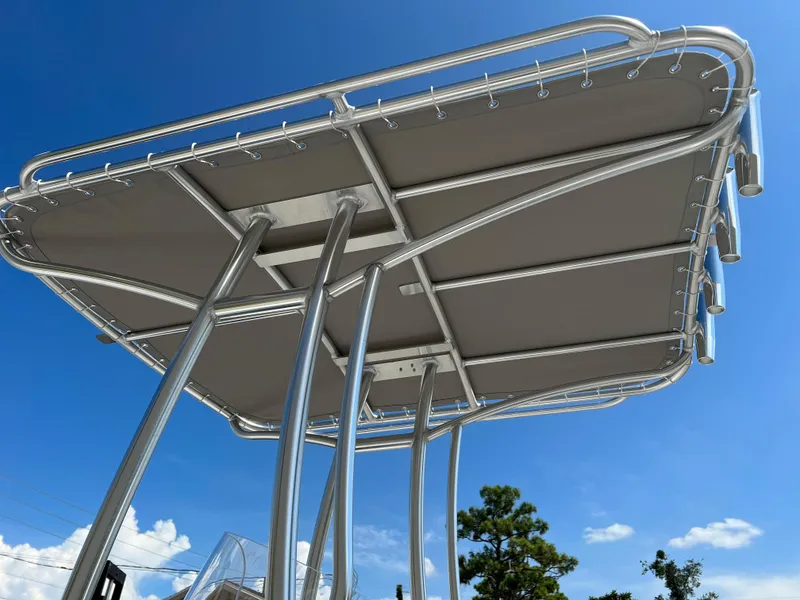 Slide: The Image of 2024 ALK2 Powerboats 18 CRS T-top under blue sky. - 14