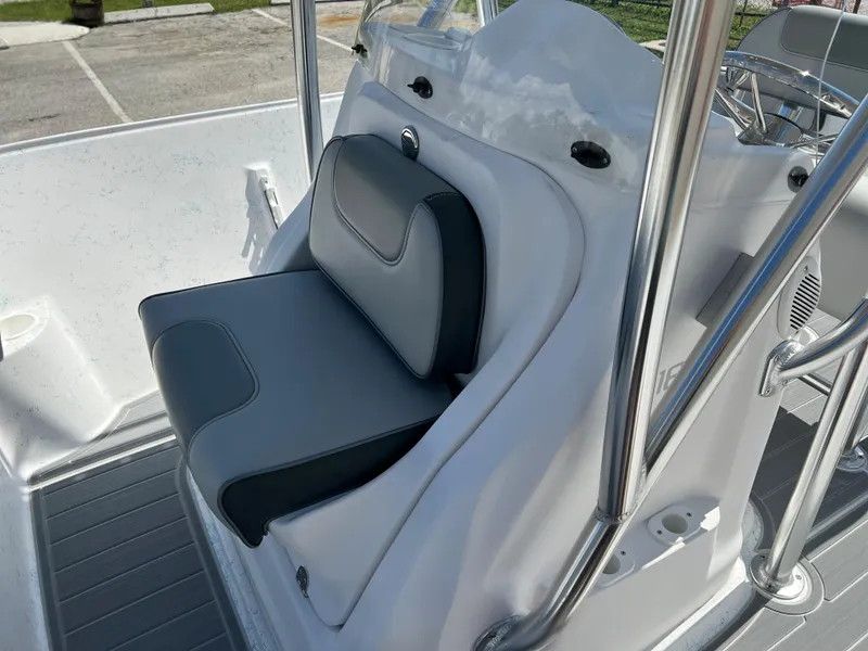 Slide: The Image of 2024 ALK2 Powerboats 18 CRS, gray and black cushioned seat, sleek design. - 17