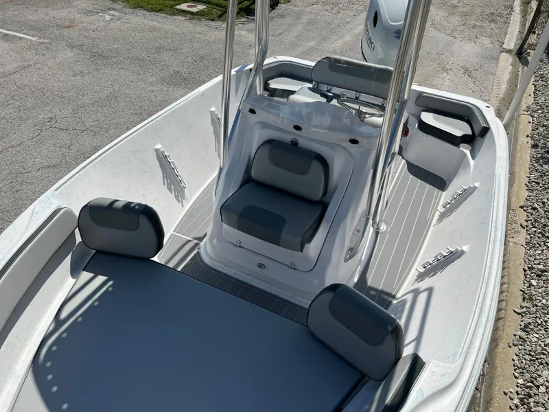Slide: The Image of 2024 ALK2 Powerboats 18 CRS center console boat with cushioned seating. - 25