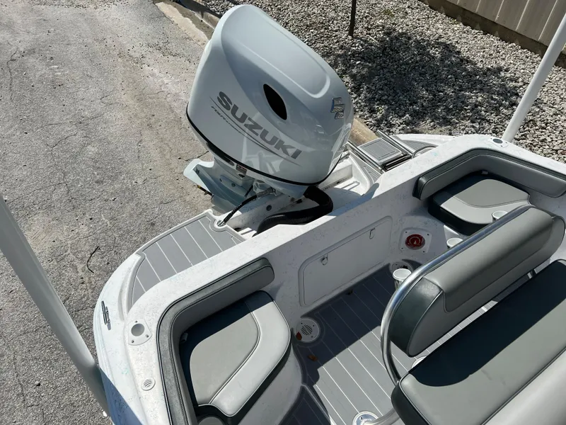 Slide: The Image of 2024 ALK2 Powerboats 18 CRS with Suzuki outboard motor, rear seating area. - 26