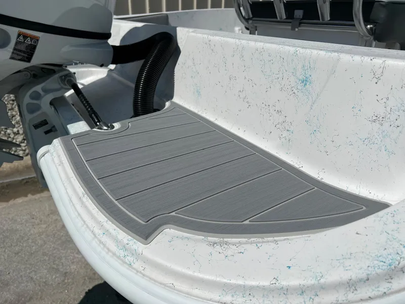 Slide: The Image of 2024 ALK2 Powerboats 18 CRS, close-up of deck and motor. - 6