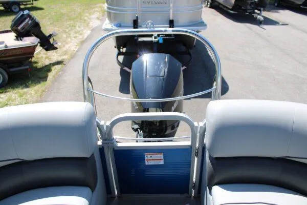 Slide: The Image of 2021 Lowe SS250 Super Sport boat rear view with motor and seating. - 14