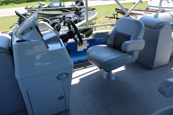 Slide: The Image of 2021 Lowe SS250 Super Sport boat interior with captain's chair and control console. - 5