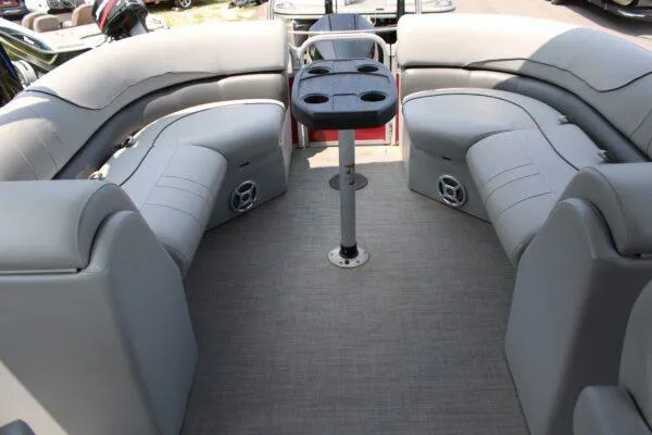 Slide: The Image of 2021 Lowe SS250 Super Sport boat interior with gray seating and cup holders. - 11