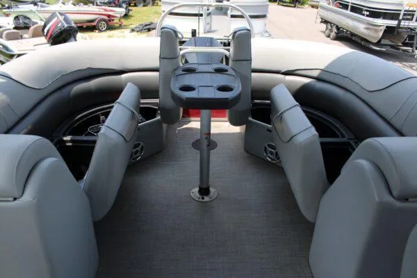 Slide: The Image of 2021 Lowe SS250 Super Sport boat interior with seating and table. - 12