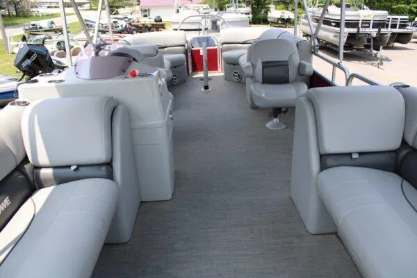 Slide: The Image of 2021 Lowe SS250 Super Sport pontoon boat with spacious seating and modern interior. - 3
