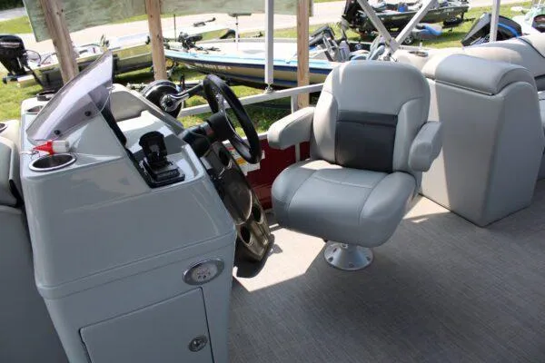 Slide: The Image of 2021 Lowe SS250 Super Sport boat interior with captain's chair and control console. - 5