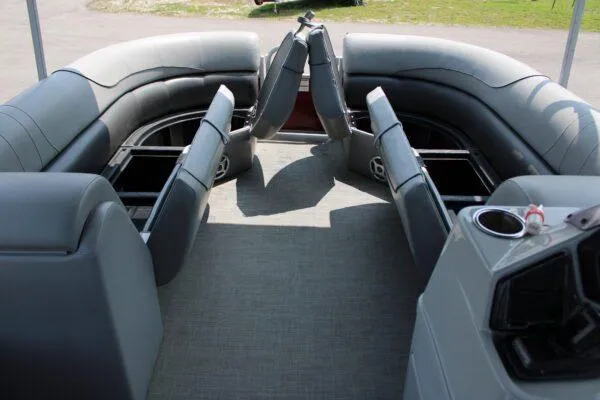 Slide: The Image of 2021 Lowe SS250 Super Sport boat interior with open storage compartments. - 7