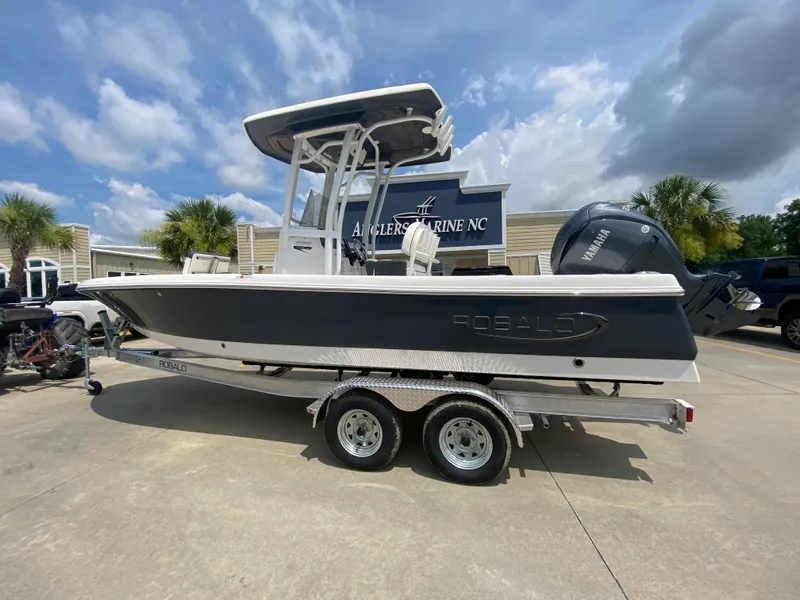 The Image of 2024 Robalo 226 Cayman boat on a trailer at Anglers Marine NC. - 0